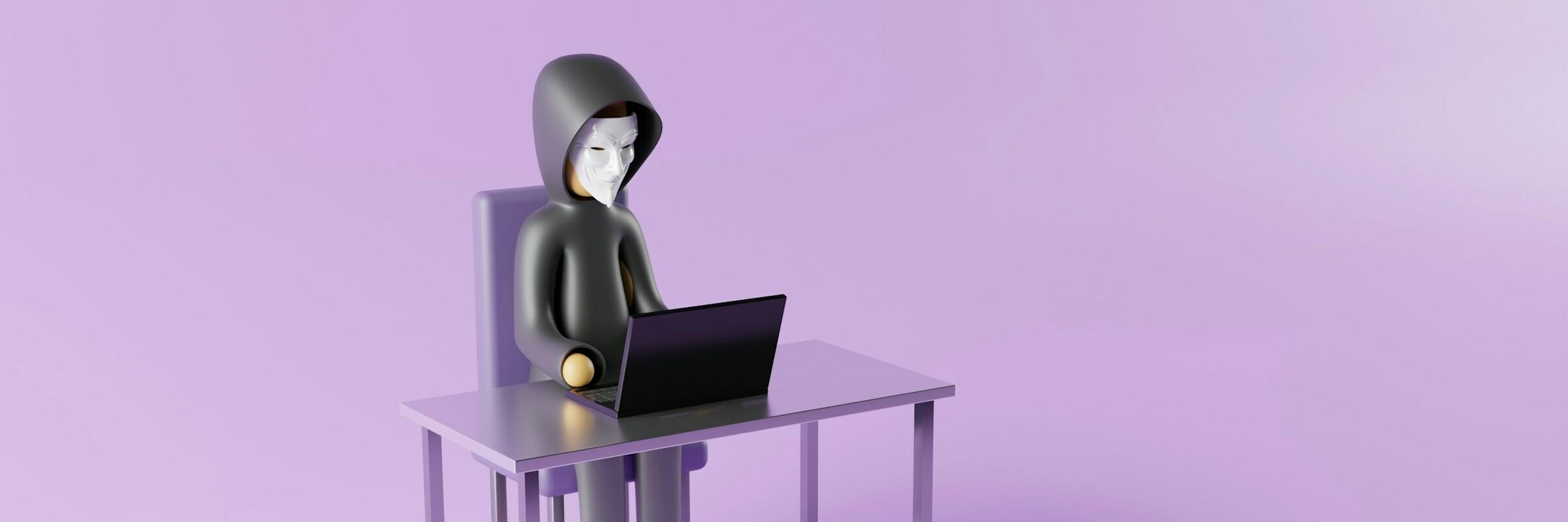 Person mit Maske am Laptop
